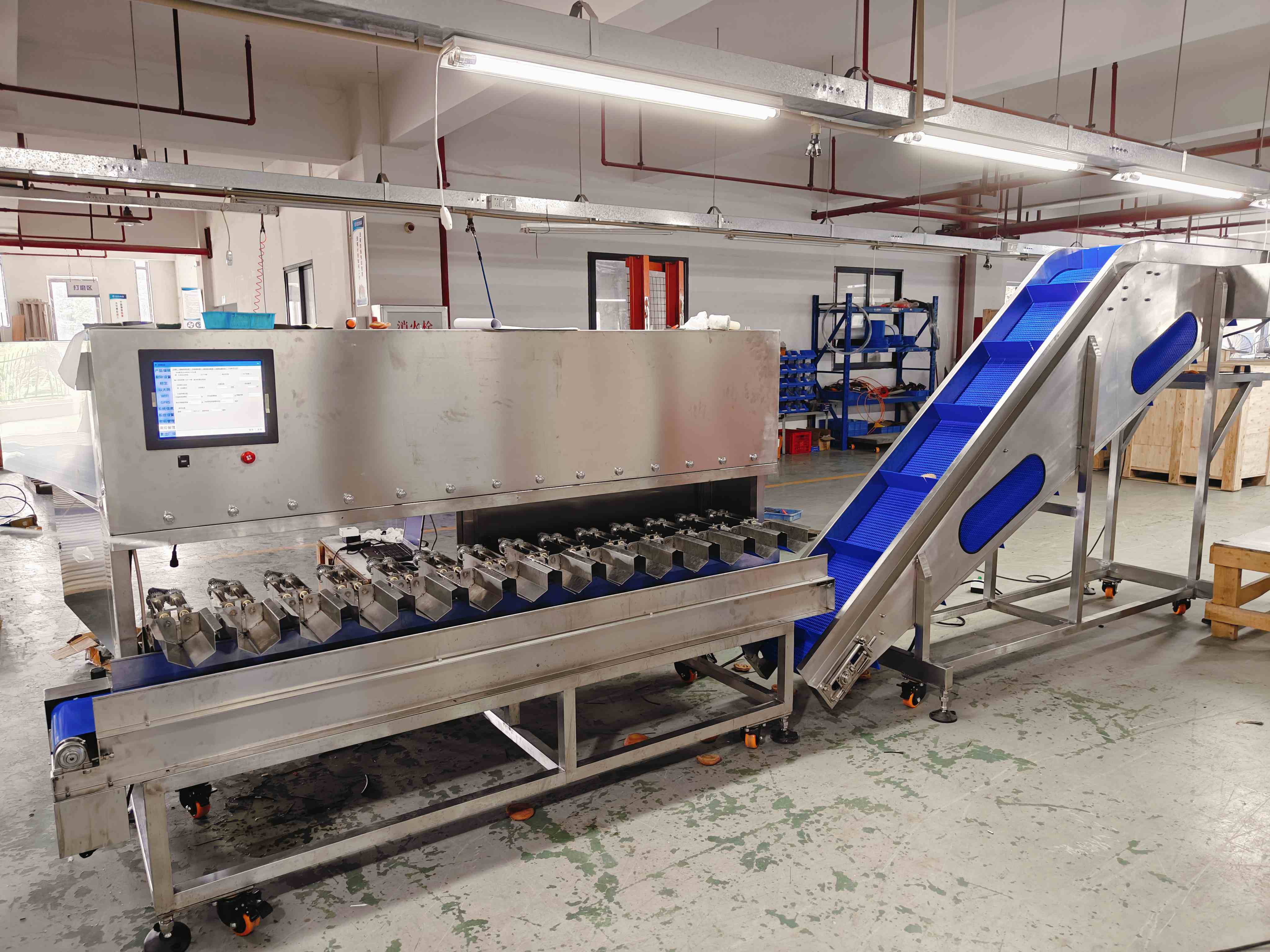 1734425215119378.jpg 多頭秤搭配爬坡機.jpg